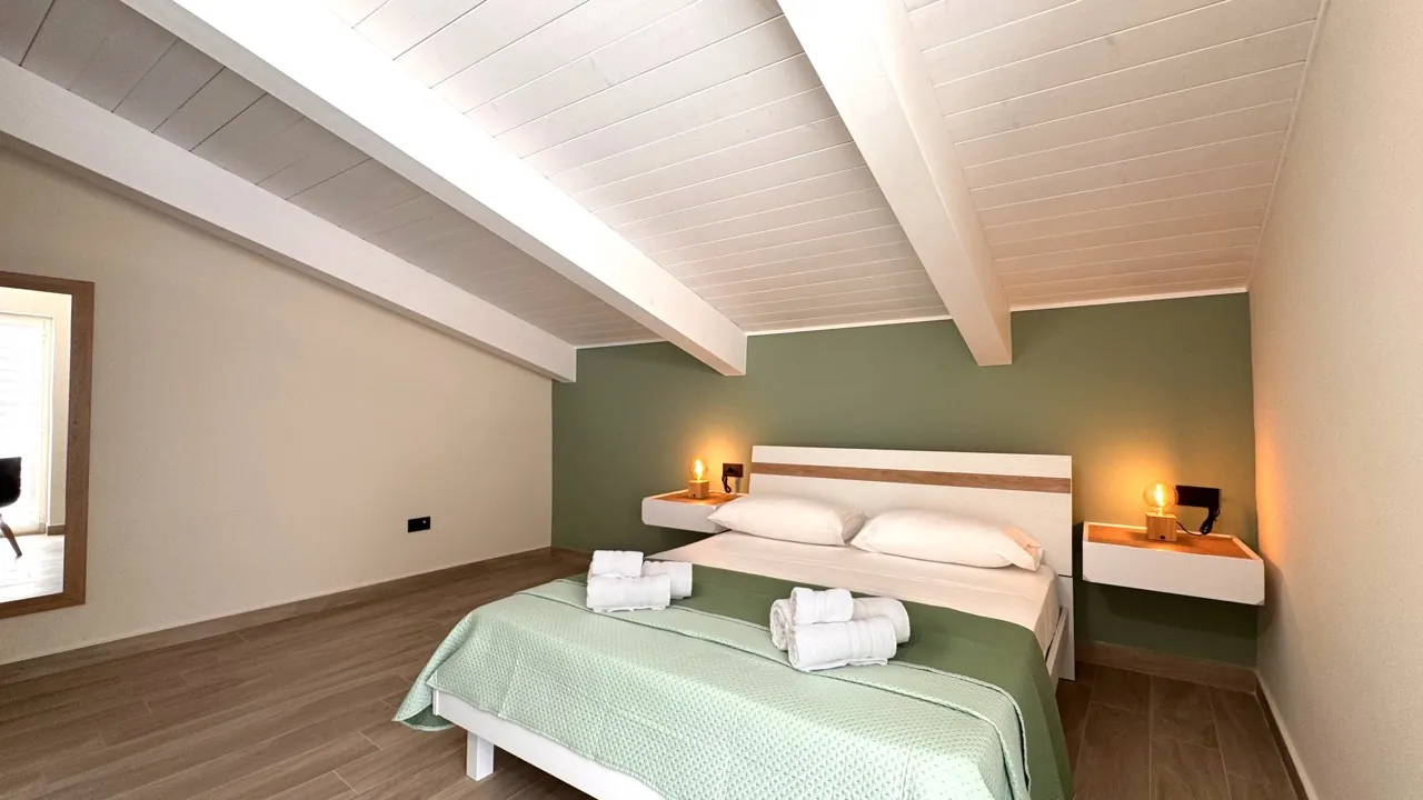 Separate bedroom with French double bed